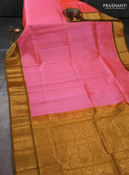 Kuppadam silk cotton saree candy pink and mustard green with allover laksha deepam pattern and temple design zari woven border