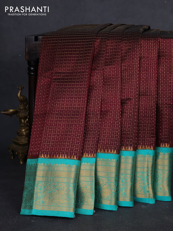 Kuppadam silk cotton saree deep maroon and teal green with allover laksha deepam pattern and temple design zari woven border