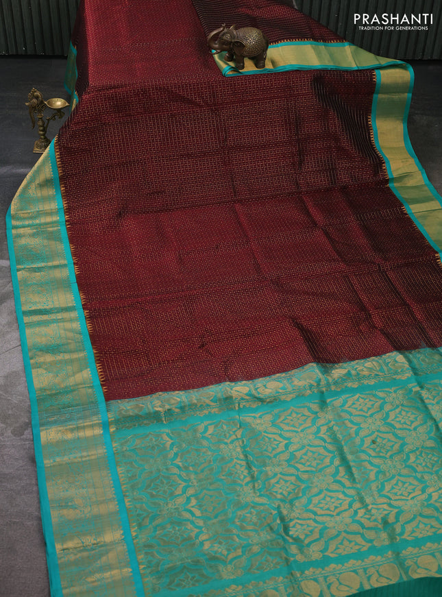 Kuppadam silk cotton saree deep maroon and teal green with allover laksha deepam pattern and temple design zari woven border