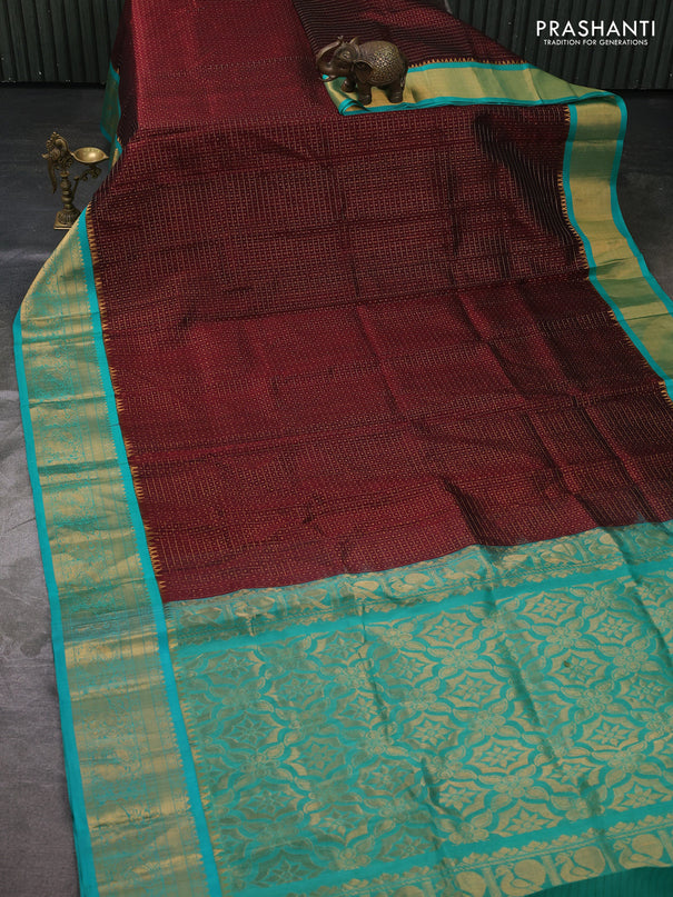 Kuppadam silk cotton saree deep maroon and teal green with allover laksha deepam pattern and temple design zari woven border
