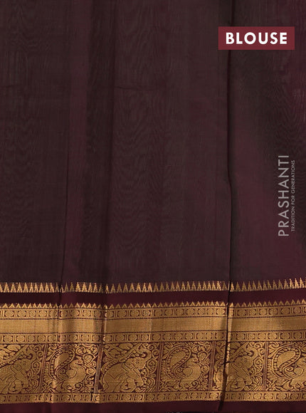 Kuppadam silk cotton saree pista green and coffee brown with allover laksha deepam pattern and temple design zari woven border