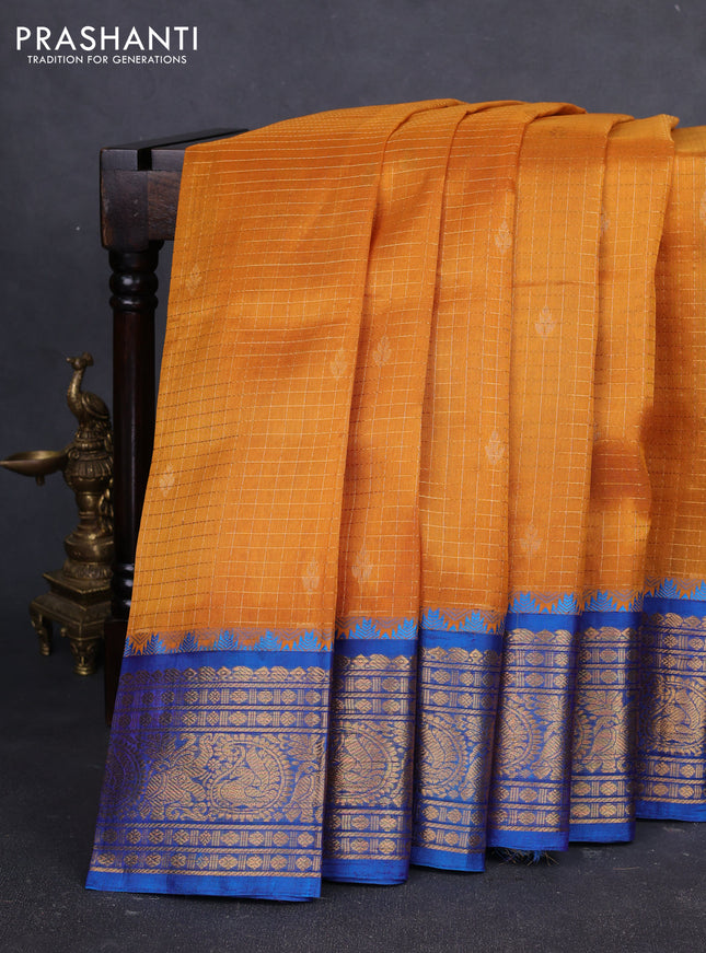 Kuppadam silk cotton saree dark mustard and blue with allover zari checked pattern and temple design zari woven border