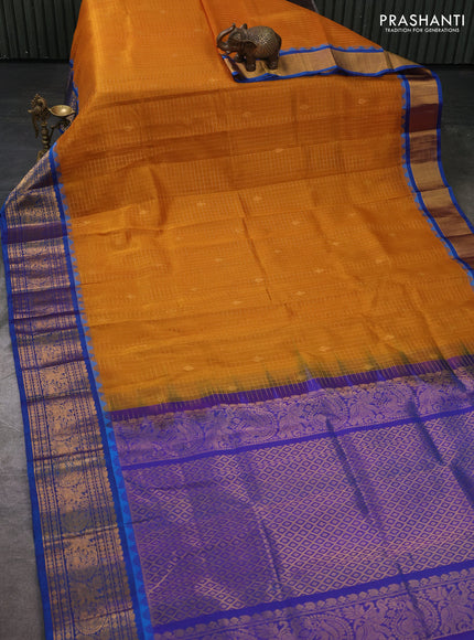 Kuppadam silk cotton saree dark mustard and blue with allover zari checked pattern and temple design zari woven border