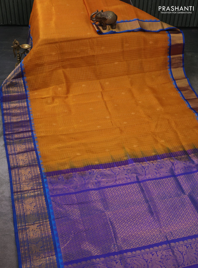 Kuppadam silk cotton saree dark mustard and blue with allover zari checked pattern and temple design zari woven border