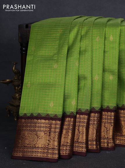 Kuppadam silk cotton saree with allover zari checked pattern and temple design zari woven border