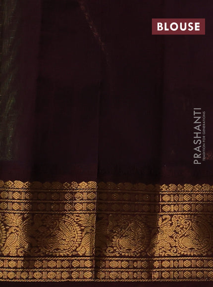 Kuppadam silk cotton saree with allover zari checked pattern and temple design zari woven border