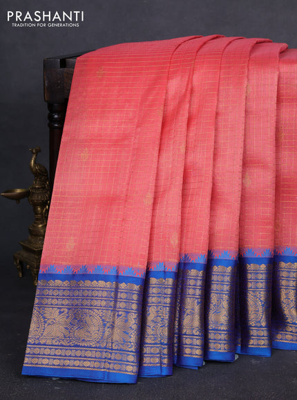 Kuppadam silk cotton saree peach orange and cs blue with allover zari checked pattern and temple design zari woven border