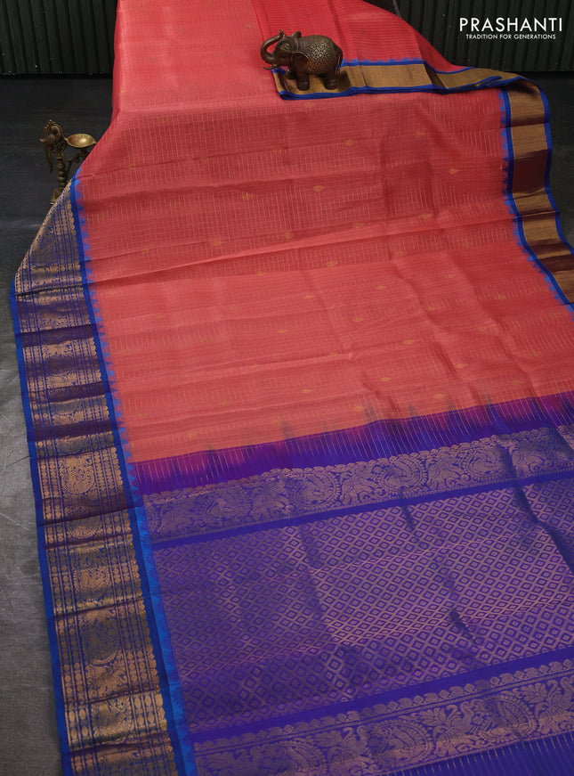 Kuppadam silk cotton saree peach orange and cs blue with allover zari checked pattern and temple design zari woven border