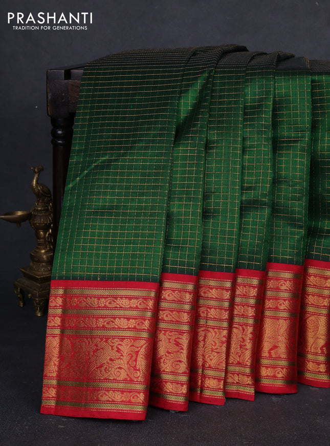 Kuppadam silk cotton saree bottle green and red with allover zari checked pattern and long zari woven korvai border