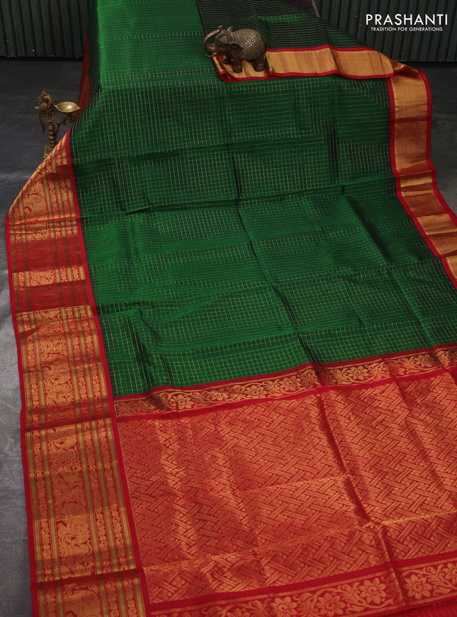 Kuppadam silk cotton saree bottle green and red with allover zari checked pattern and long zari woven korvai border