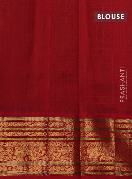 Kuppadam silk cotton saree bottle green and red with allover zari checked pattern and long zari woven korvai border