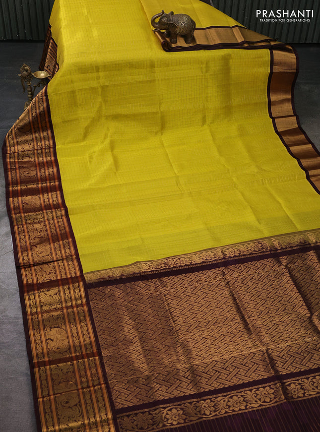 Kuppadam silk cotton saree lime green and coffee brown with allover zari checked pattern and long zari woven korvai border