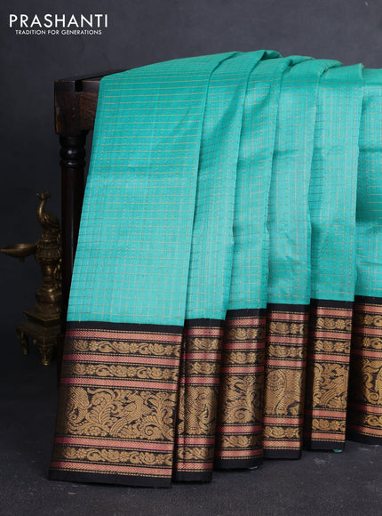Kuppadam silk cotton saree teal green and black with allover zari checked pattern and long zari woven korvai border