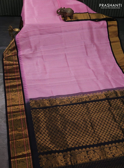 Kuppadam silk cotton saree light pink and black with allover laksha deepam pattern and temple design zari woven border