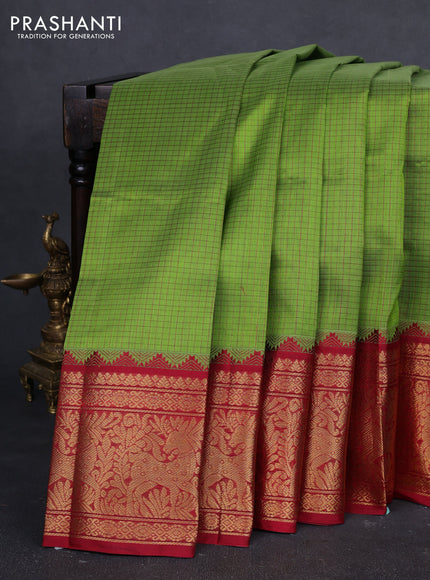 Kuppadam silk cotton saree light green and maroon with allover thread checked pattern and temple design long zari woven border