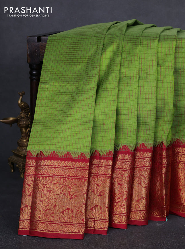 Kuppadam silk cotton saree light green and maroon with allover thread checked pattern and temple design long zari woven border