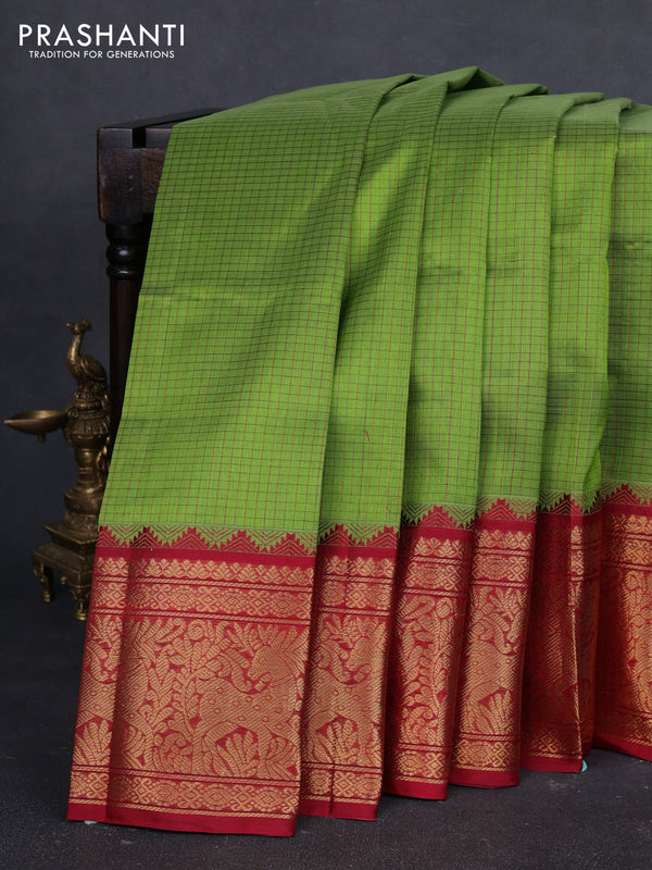 Kuppadam silk cotton saree light green and maroon with allover thread checked pattern and temple design long zari woven border