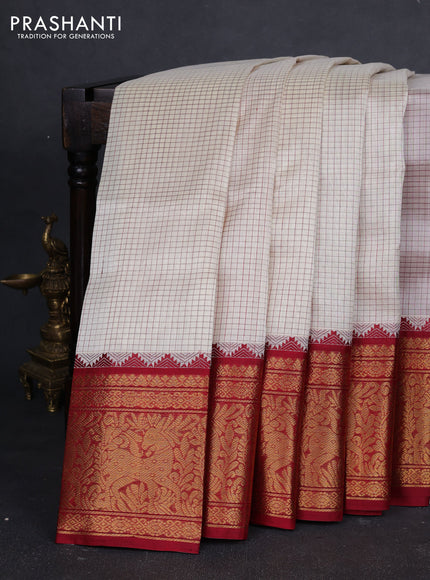 Kuppadam silk cotton saree beige and maroon with allover thread checked pattern and temple design long zari woven border