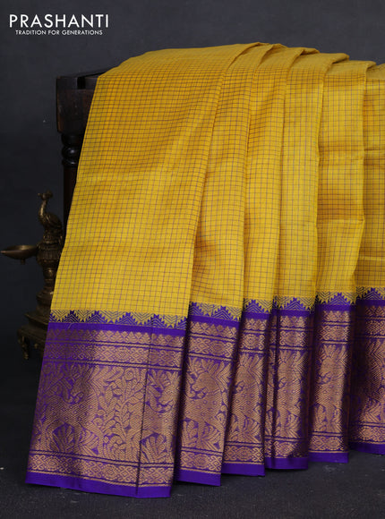 Kuppadam silk cotton saree yellow and royal blue with allover thread checked pattern and temple design zari woven border
