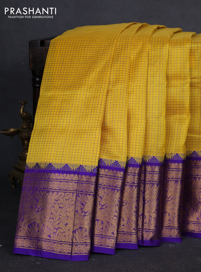 Kuppadam silk cotton saree yellow and royal blue with allover thread checked pattern and temple design zari woven border