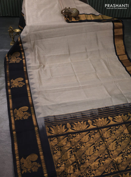 Kuppadam silk cotton saree beige and black with allover thread checked pattern and temple design rettapet zari woven butta border