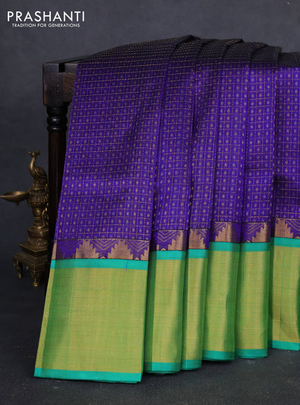 Kuppadam silk cotton saree royal blue and teal green with allover laksha deepam pattern and temple design zari woven border