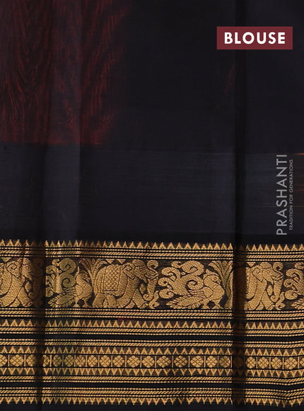 Kuppadam silk cotton saree orange and black with allover laksha deepam pattern and temple design zari woven border