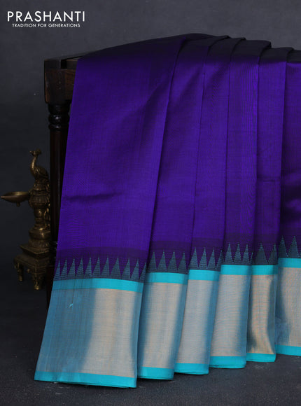 Kuppadam silk cotton saree deep violet and teal blue with plain body and temple design zari woven border