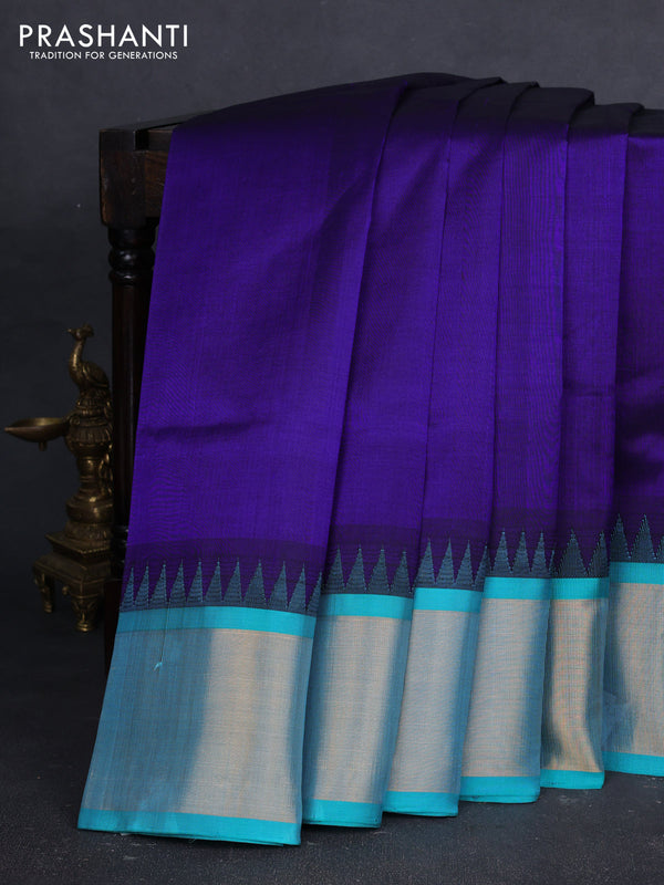 Kuppadam silk cotton saree deep violet and teal blue with plain body and temple design zari woven border