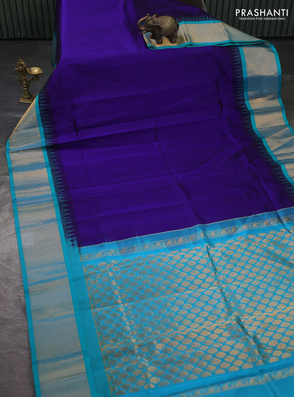 Kuppadam silk cotton saree deep violet and teal blue with plain body and temple design zari woven border