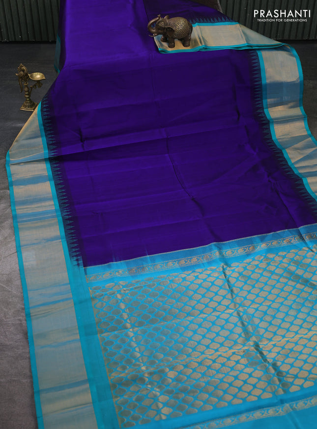 Kuppadam silk cotton saree deep violet and teal blue with plain body and temple design zari woven border