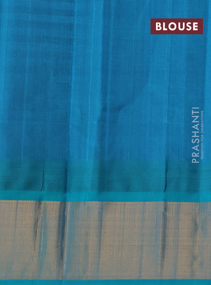 Kuppadam silk cotton saree deep violet and teal blue with plain body and temple design zari woven border