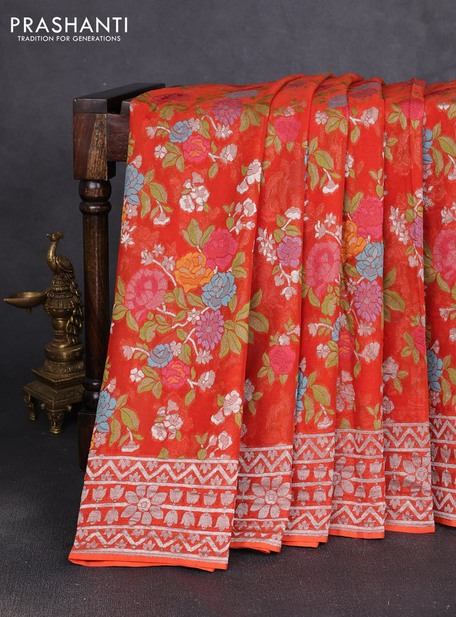 Art chiffon saree orange with allover thread & zari floral weaves and zari woven border