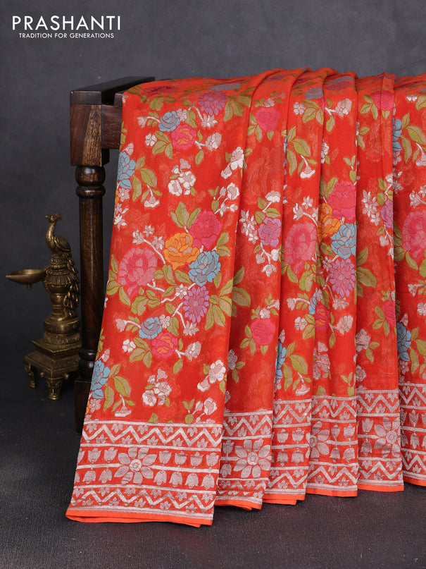 Art chiffon saree orange with allover thread & zari floral weaves and zari woven border