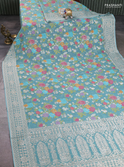 Art chiffon saree pastel blue with allover thread & zari floral weaves and zari woven border