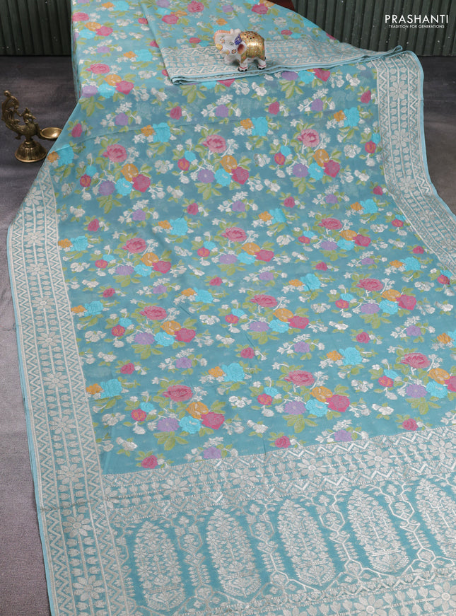 Art chiffon saree pastel blue with allover thread & zari floral weaves and zari woven border