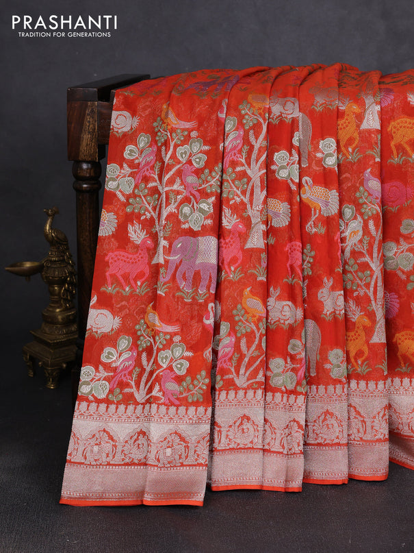 Art chiffon saree orange with allover vanasingaram weaves and zari woven border