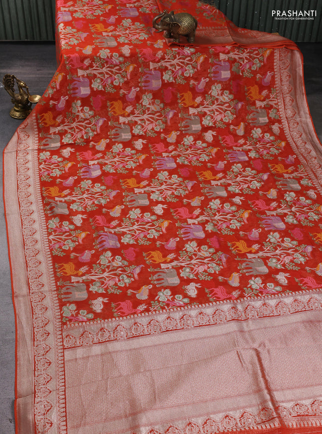 Art chiffon saree orange with allover vanasingaram weaves and zari woven border