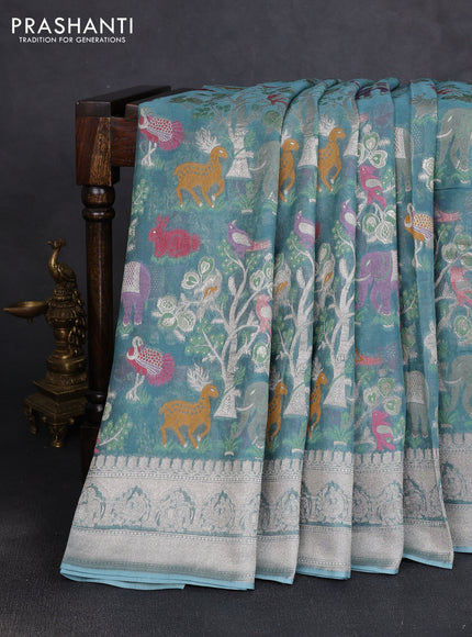 Art chiffon saree pastel blue with allover vanasingaram weaves and zari woven border