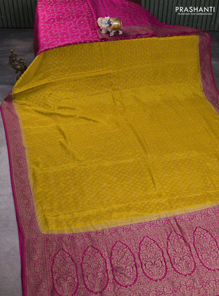 Banarasi crepe partly saree yellow and pink with allover thread & zari woven buttas and woven border