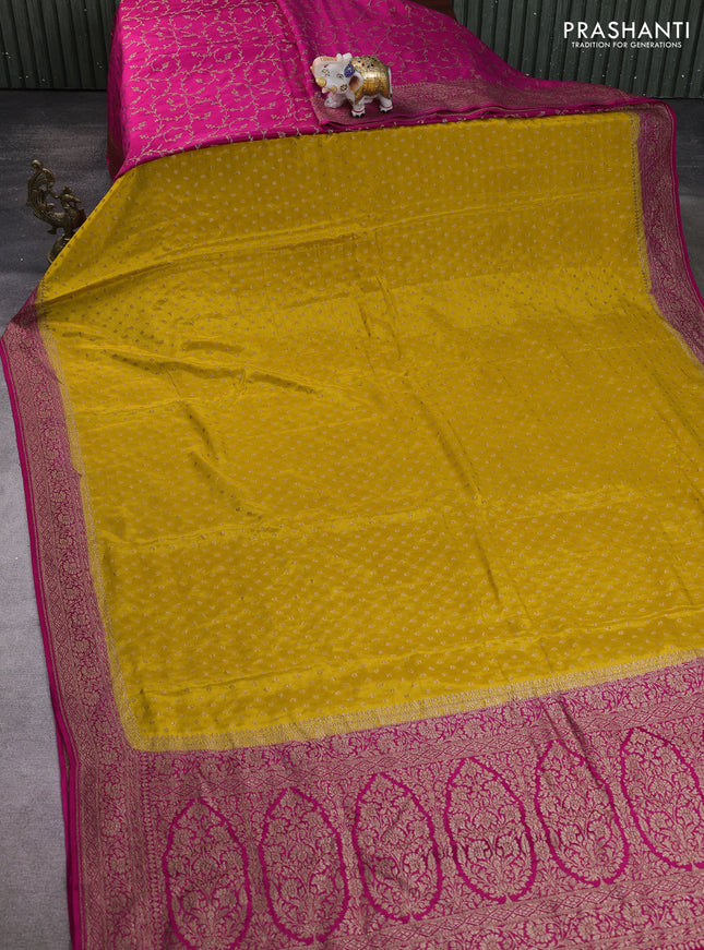 Banarasi crepe partly saree yellow and pink with allover thread & zari woven buttas and woven border