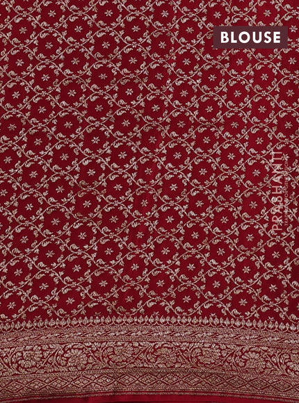 Banarasi crepe partly saree bottle green and red with allover thread & zari woven buttas and woven border