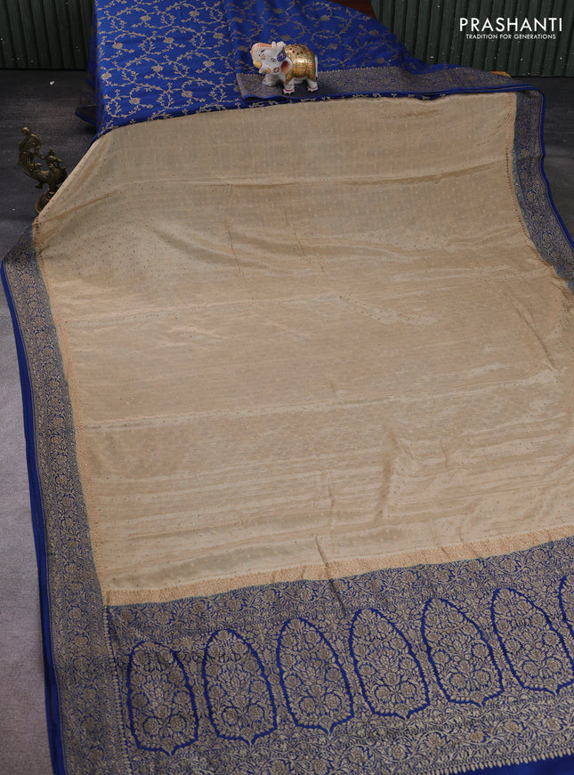 Banarasi crepe partly saree beige and blue with allover thread & zari woven buttas and woven border