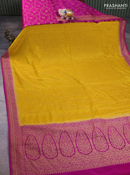 Banarasi crepe partly saree yellow and pink with allover thread & zari woven buttas and woven border