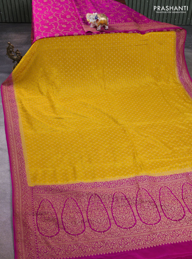 Banarasi crepe partly saree yellow and pink with allover thread & zari woven buttas and woven border