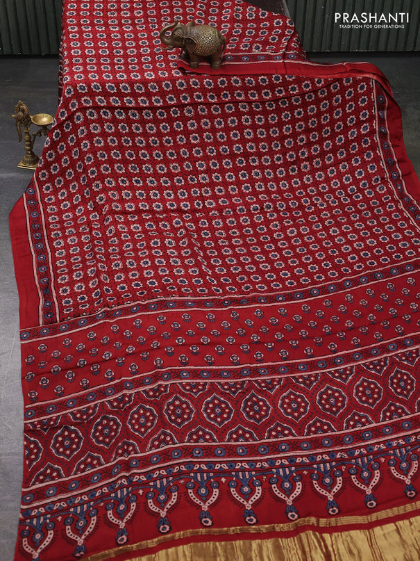 Modal silk saree maroon with allover ajrakh prints and printed border