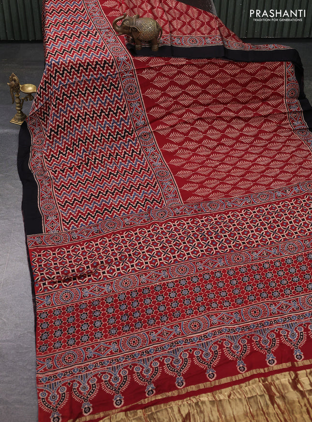 Modal silk saree maroon and black with allover ajrakh prints and printed border