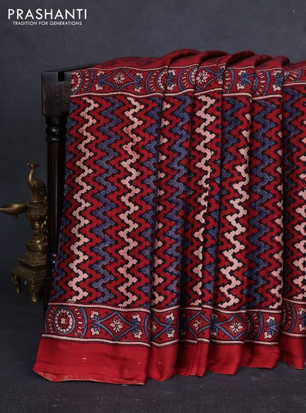 Modal silk saree maroon with allover ajrakh prints and printed border
