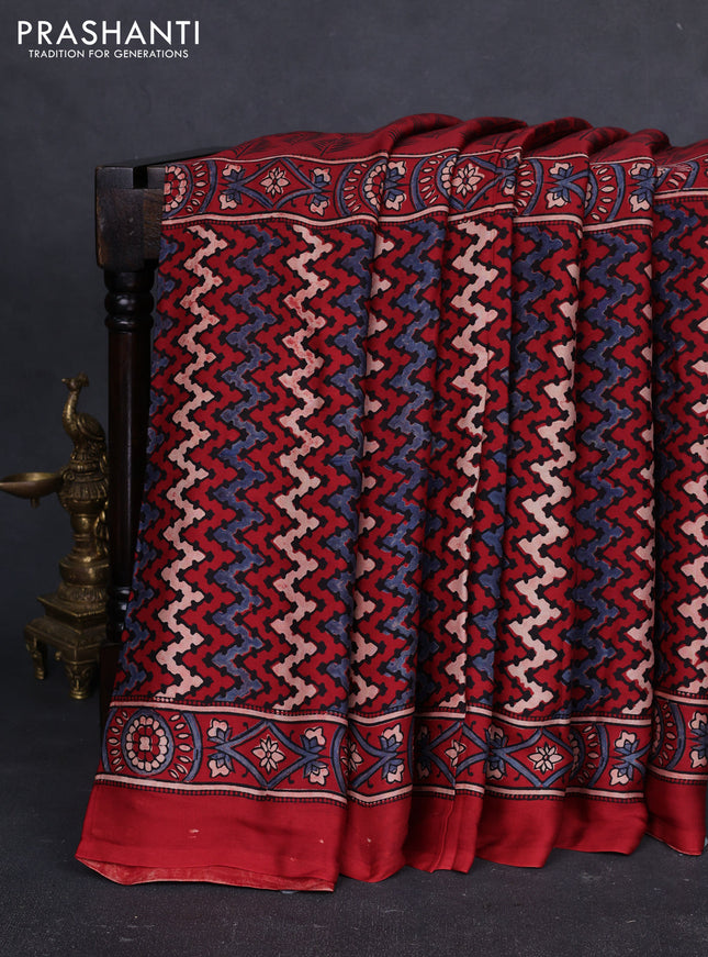 Modal silk saree maroon with allover ajrakh prints and printed border