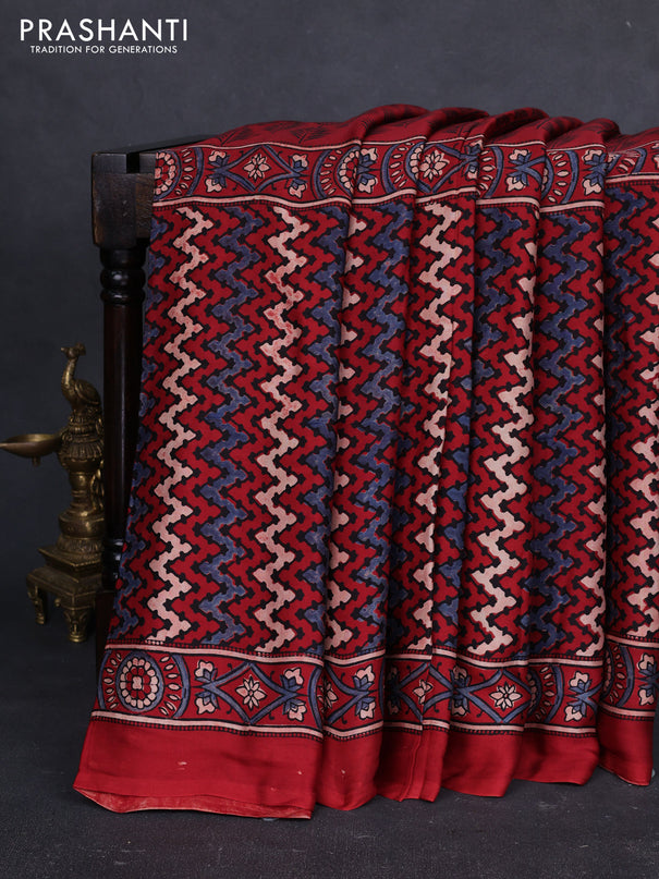 Modal silk saree maroon with allover ajrakh prints and printed border